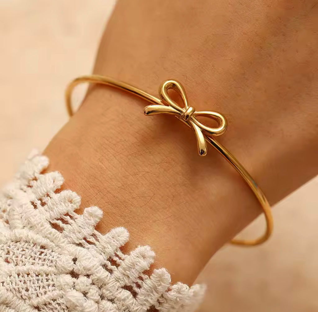 Gold bow cuff