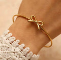 Gold bow cuff