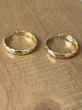 Braided hoops in gold