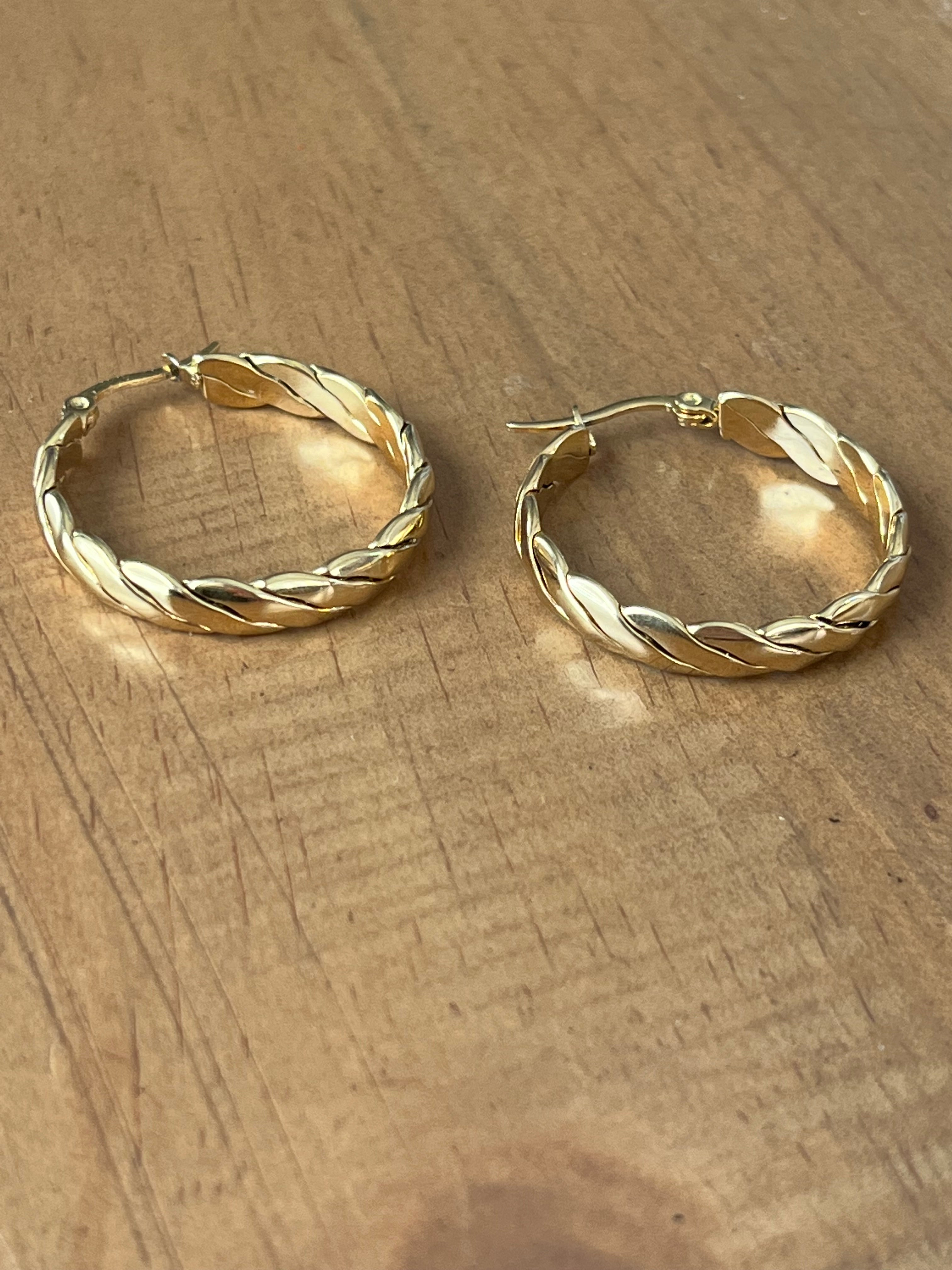 Braided hoops in gold